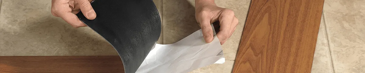 A professional installing vinyl flooring in Riverside, CA